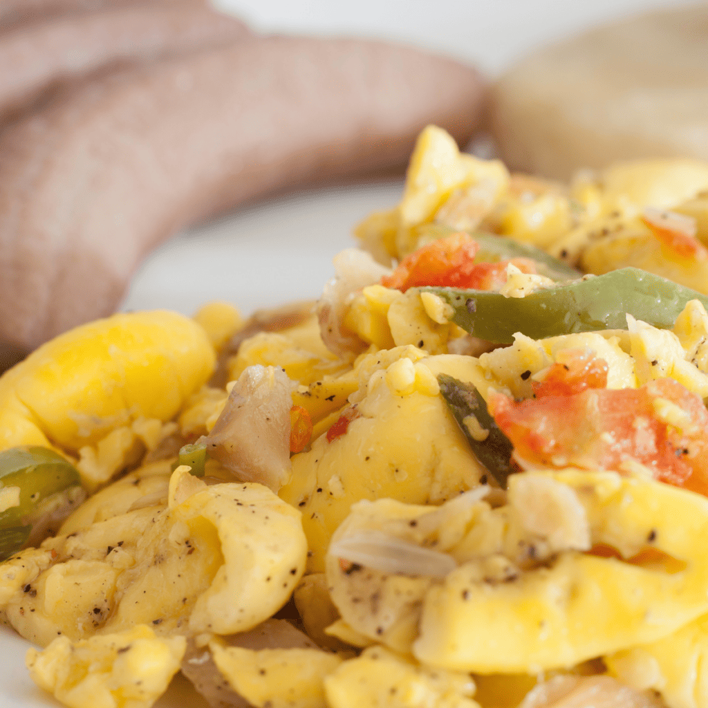 A picture of ackee and saltfish with dumpling and plantain