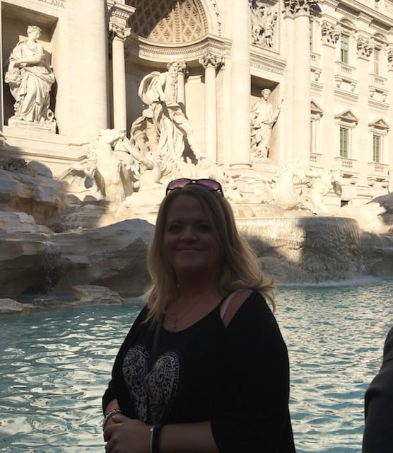 louise at the Trevi fountain in Italy