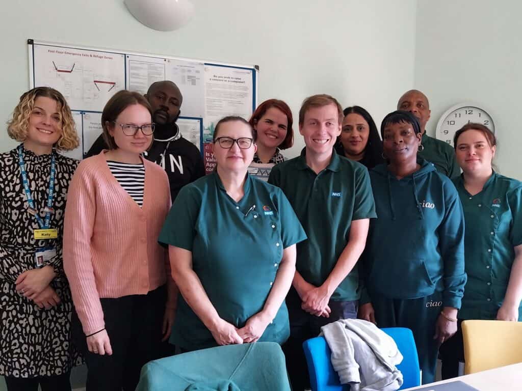 the team and patients smiling