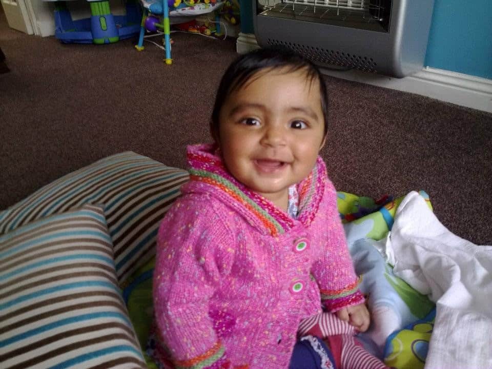 Sobhia's baby girl smiling 